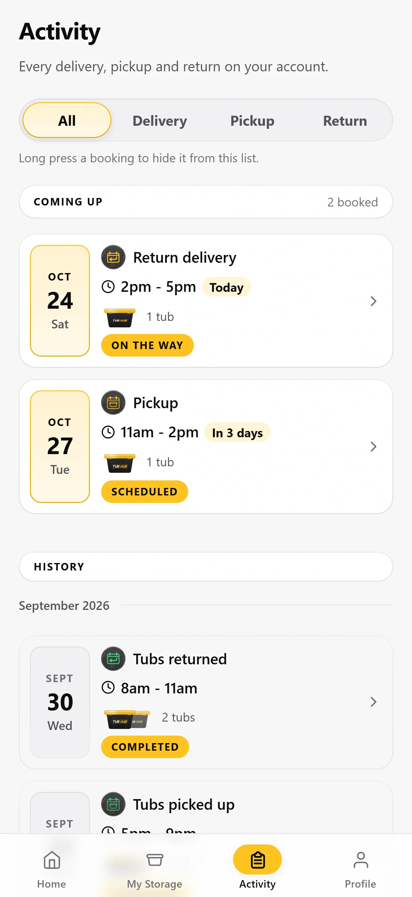 TubHub app Activity tab: upcoming return delivery and pickup with their time windows, and a history of completed bookings.